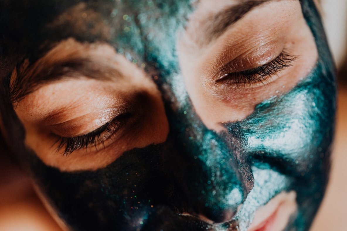 woman with face mask treatment